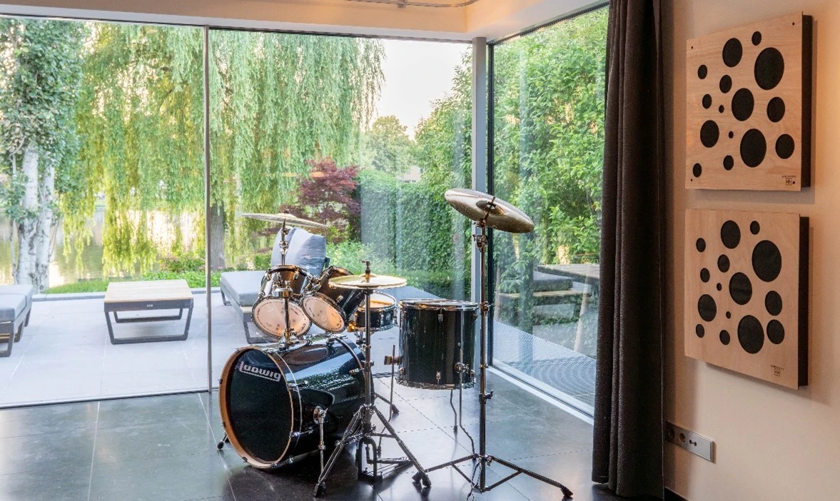 Professional recording studio with acoustic panels on walls